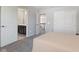 Bedroom with ensuite bathroom access features neutral carpet and a large closet for ultimate convenience at 3678 Sugar Pine Ln, Zionsville, IN 46077
