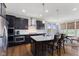 Stylish kitchen featuring stainless steel appliances, granite countertops, and a breakfast nook at 3678 Sugar Pine Ln, Zionsville, IN 46077