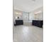 Bright main bathroom featuring double sinks, a soaking tub, neutral tile floors, and plenty of natural light at 3678 Sugar Pine Ln, Zionsville, IN 46077