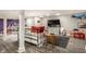 Finished basement with a daybed, playroom, and durable floors at 440 E 82Nd St, Indianapolis, IN 46240