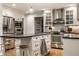 Well-appointed kitchen with stainless appliances, center island, and modern finishes at 440 E 82Nd St, Indianapolis, IN 46240