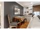 Cozy living room features wooden floors, decor, and built-in bookshelves at 440 E 82Nd St, Indianapolis, IN 46240