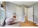 Cozy bedroom featuring hardwood floors and neutral gray walls providing a soothing atmosphere at 473 N 17Th St, Noblesville, IN 46060