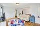 Cozy living room with hardwood floors, neutral walls, and comfortable seating, perfect for relaxation and gatherings at 473 N 17Th St, Noblesville, IN 46060