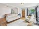 Bright living room featuring hardwood floors, neutral walls, and comfortable seating, creating a warm and inviting atmosphere at 473 N 17Th St, Noblesville, IN 46060
