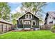 Spacious backyard featuring a well-maintained lawn and a cozy patio area at 4917 N Park Ave, Indianapolis, IN 46205