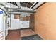Unfinished basement with water heater, storage options, and potential for customization at 4917 N Park Ave, Indianapolis, IN 46205