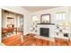Bright living room with hardwood floors, fireplace, and open layout at 4917 N Park Ave, Indianapolis, IN 46205