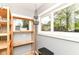 Bright sunroom with lots of natural light, shelving, and storage, perfect for plants at 4917 N Park Ave, Indianapolis, IN 46205