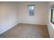 This bedroom is freshly painted with cozy carpeting at 4927 Mathews Ave, Indianapolis, IN 46227