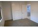 This bedroom features built in storage with a large closet at 4927 Mathews Ave, Indianapolis, IN 46227