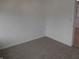 Bright bedroom with neutral carpeting and white trim at 4927 Mathews Ave, Indianapolis, IN 46227