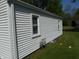 Close-up of white siding and gas meter on the exterior of this lovely home at 4927 Mathews Ave, Indianapolis, IN 46227