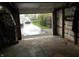 Garage view looking out onto driveway and adjacent homes at 4927 Mathews Ave, Indianapolis, IN 46227
