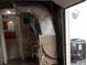 Basement view of the furnace and ductwork for the property's HVAC system at 4927 Mathews Ave, Indianapolis, IN 46227