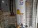 Basement view of the water heater with visible product labeling at 4927 Mathews Ave, Indianapolis, IN 46227
