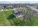 Home with a vast, green backyard surrounded by a residential neighborhood, captured from an aerial perspective at 4940 Sundance Trl, Indianapolis, IN 46239