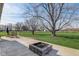 Large backyard featuring a fire pit and ample yard space at 4940 Sundance Trl, Indianapolis, IN 46239