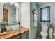 Charming bathroom featuring a live edge vanity, vessel sink and shiplap walls at 4940 Sundance Trl, Indianapolis, IN 46239