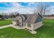 Charming two-story home with brick and siding exterior, featuring a well-manicured lawn and landscaping at 4940 Sundance Trl, Indianapolis, IN 46239