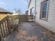 Outdoor deck with wood railing and built-in bench seating at 5080 Norwaldo Ave, Indianapolis, IN 46205
