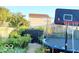Backyard features mature landscaping and outdoor recreation equipment at 5411 Cliff Ridge Dr, Indianapolis, IN 46217