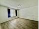 Bright bedroom featuring modern flooring, fresh paint, and a sunlit window that offers a relaxing retreat at 5411 Cliff Ridge Dr, Indianapolis, IN 46217