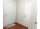 Bright entryway featuring a front door and hardwood floors at 5411 Cliff Ridge Dr, Indianapolis, IN 46217