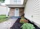 Charming two-story home featuring a brick facade and a meticulously landscaped yard at 5411 Cliff Ridge Dr, Indianapolis, IN 46217