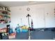 Garage with ample storage shelving and room for vehicles at 5411 Cliff Ridge Dr, Indianapolis, IN 46217