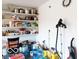 Organized garage featuring shelves, storage, and various household items at 5411 Cliff Ridge Dr, Indianapolis, IN 46217