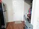 Utility area includes laundry machines and a refrigerator, providing functionality and convenience at 5411 Cliff Ridge Dr, Indianapolis, IN 46217