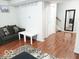 Spacious living room featuring hardwood floors and a comfortable sofa at 5411 Cliff Ridge Dr, Indianapolis, IN 46217