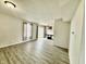 Open-concept living and dining areas with modern flooring and ample natural light create an inviting space at 5411 Cliff Ridge Dr, Indianapolis, IN 46217