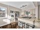 Modern kitchen with granite countertops, stainless steel appliances, and stylish bar stools at 5504 Indianola Ave, Indianapolis, IN 46220
