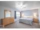 Inviting bedroom with soft gray walls, neutral carpet, and ample natural light from the window at 562 Covered Bridge Rd, Greenwood, IN 46142