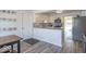 Bright kitchen with white cabinets, stainless steel appliances, granite counters, and modern backsplash at 562 Covered Bridge Rd, Greenwood, IN 46142