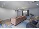 Spacious living room offering recessed lights, multiple seating areas, neutral paint, and a window for natural light at 562 Covered Bridge Rd, Greenwood, IN 46142