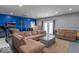 Large, versatile living area with bright blue accent wall, recessed lighting, and lots of room to relax and entertain at 562 Covered Bridge Rd, Greenwood, IN 46142