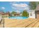 Above-ground pool with surrounding deck, perfect for summer fun and recreation in a backyard setting at 562 Covered Bridge Rd, Greenwood, IN 46142