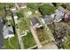An aerial view of the property with clearly defined property lines, a detached garage and a long driveway at 5938 Haverford Ave, Indianapolis, IN 46220