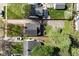 Aerial shot displaying the property layout, including yard, garage, and street access at 5938 Haverford Ave, Indianapolis, IN 46220