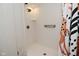 Modern bathroom with a bright shower, built-in shelves, and stylish fixtures, perfect for relaxation at 5938 Haverford Ave, Indianapolis, IN 46220