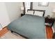 Comfortable bedroom with plush carpet, soothing colors, and natural light creates a relaxing atmosphere at 5938 Haverford Ave, Indianapolis, IN 46220