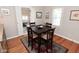 Dining room featuring a dark wood table and a view of the breakfast nook at 5938 Haverford Ave, Indianapolis, IN 46220