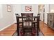 Inviting dining room with hardwood floors and a decorative rug at 5938 Haverford Ave, Indianapolis, IN 46220