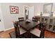 Dining room featuring a dark wood table and cabinet at 5938 Haverford Ave, Indianapolis, IN 46220