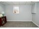 Bright room with gray carpet and neutral walls, ideal for a bedroom, office, or bonus space at 5938 Haverford Ave, Indianapolis, IN 46220