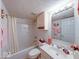 Bright bathroom featuring a shower-tub combination, vanity, and coordinated fixtures and decor at 6146 Franklin Villas Way, Indianapolis, IN 46237