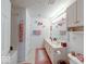 Well-lit bathroom features a shower-tub combination and a double vanity with matching decor at 6146 Franklin Villas Way, Indianapolis, IN 46237